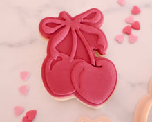 Load image into Gallery viewer, Cherries with Bow Fondant Pop Embosser and Cutter - Made in the UK with Love  from House of Toot Sweet - Just £6.50! Shop now at House of Toot Sweet
