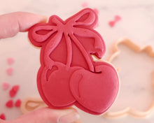 Load image into Gallery viewer, Cherries with Bow Fondant Pop Embosser and Cutter - Made in the UK with Love  from House of Toot Sweet - Just £6.50! Shop now at House of Toot Sweet
