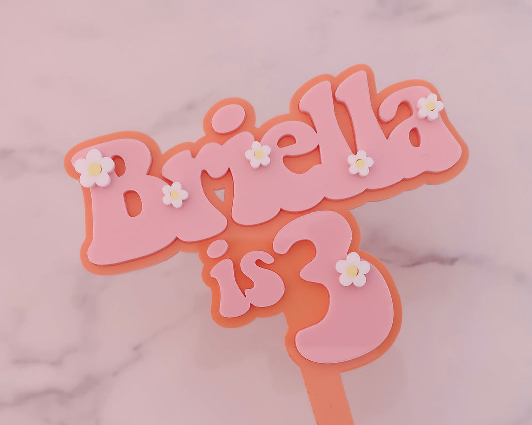 Briella is 3 Groovy Retro Hippie Flower Power Cake Topper - Made in the UK with Love  from House of Toot Sweet - Just £7! Shop now at House of Toot Sweet