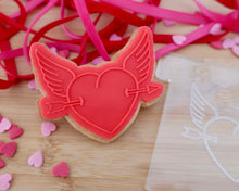 Load image into Gallery viewer, Winged  Heart  With Arrow Embosser / Cutter - Made in the UK with Love  from House of Toot Sweet - Just £6! Shop now at House of Toot Sweet
