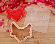 Load image into Gallery viewer, Winged  Heart  With Arrow Embosser / Cutter - Made in the UK with Love  from House of Toot Sweet - Just £6! Shop now at House of Toot Sweet
