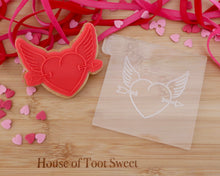 Load image into Gallery viewer, Winged  Heart  With Arrow Embosser / Cutter - Made in the UK with Love  from House of Toot Sweet - Just £6! Shop now at House of Toot Sweet
