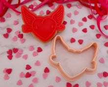 Load image into Gallery viewer, Winged  Heart  With Arrow Embosser / Cutter - Made in the UK with Love  from House of Toot Sweet - Just £6! Shop now at House of Toot Sweet
