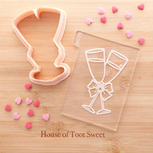 Load image into Gallery viewer, Champagne Glasses with Bow Embosser Embosser / Cutter - Made in the UK with Love  from House of Toot Sweet - Just £6! Shop now at House of Toot Sweet
